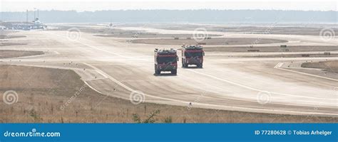 Airport fire trucks stock photo. Image of catastrophe - 77280628