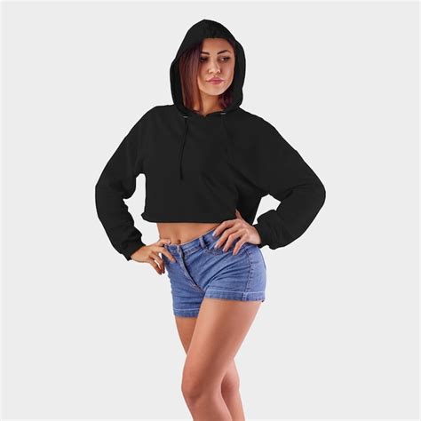 Premium Photo Black Crop Top Hoodie On A Pretty Girl In Blue Shorts Wearing A Hood In The