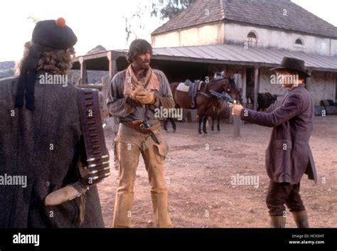 QUIGLEY DOWN UNDER, Tom Selleck (center), 1990, (c)MGM/courtesy Everett ...