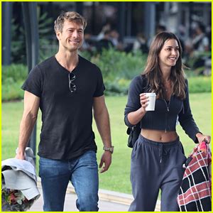 Glen Powell Greets Girlfriend Gigi Paris at the Airport in Australia ...