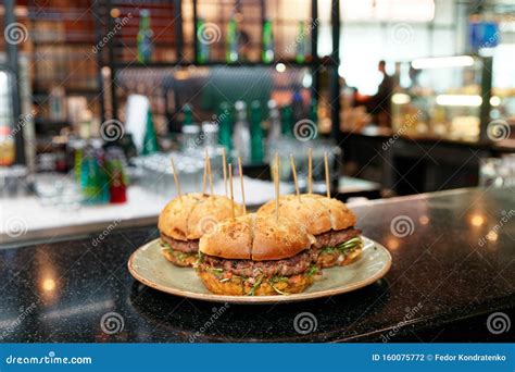 Burgers With Toothpicks On Bar Counter Stock Photo Image Of Counter