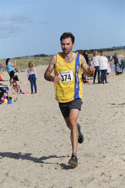 JC cracks course record at Studland Stampede | Bournemouth Athletic Club