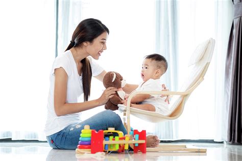 Asian Mother Play With Her Baby Photograph By Anek Suwannaphoom Pixels