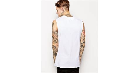 Asos Longline Sleeveless T Shirt With Dropped Armhole And Skater Fit In