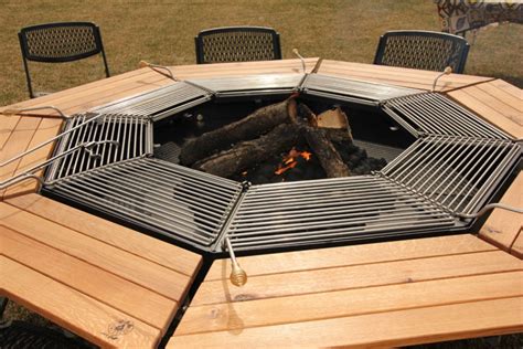 A Dining Table Firepit And Grill In One Fogueiras Ao Ar Livre