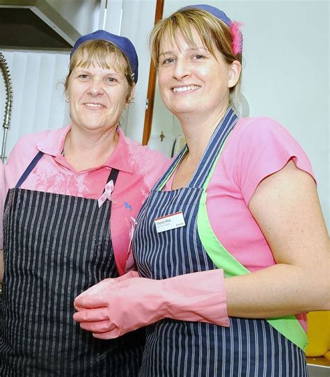 School Kitchen Staff in pvc Aprons and Rubber Gloves