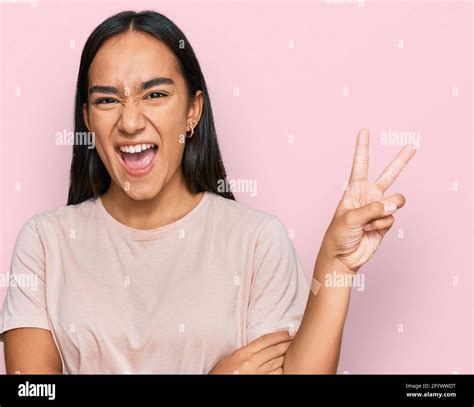 Young Asian Woman Wearing Casual Clothes Smiling With Happy Face