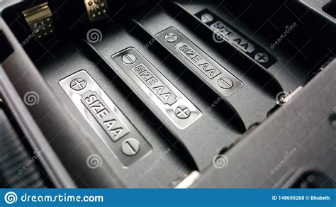 AA Battery Charge Sign or Symbol in the Black Plastic Equipment Slot ...