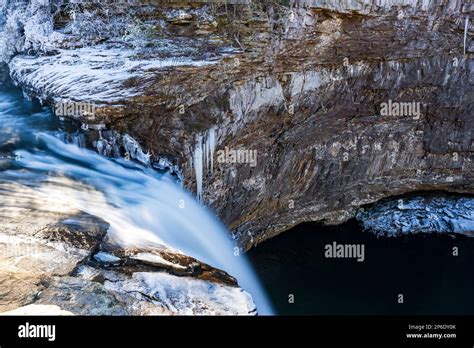 Tranquil winter scene of the Desoto Falls cascading over a rocky ...