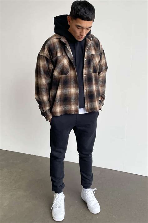 Men's black joggers, black hoodie, brown check flannel shirt and white ...