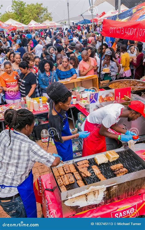 Diverse African People At A Bread Based Street Food Outdoor Festival