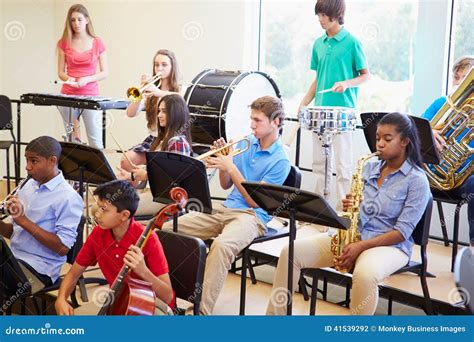 Pupils Playing Musical Instruments in School Orchestra Stock Photo - Image of horizontal ...