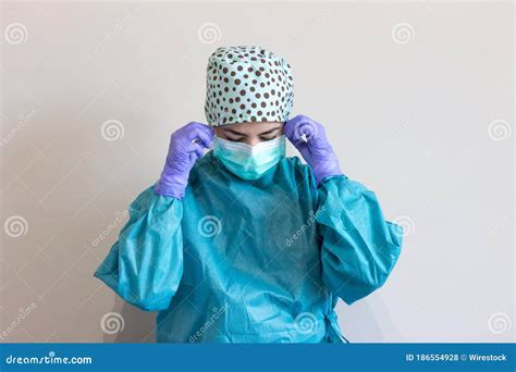 Portrait Of Nurse Wearing Coronavirus Protections With Hygienic Face