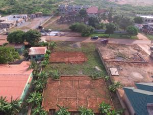 Land Close To The Main Road With Footings Of Shops And House In Accra