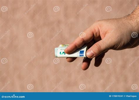 Man Hands Giving Money Like A Bribe Or Tips Holding EURO Banknotes On