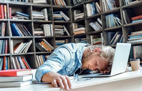 Funny Tired Sleepy University Student Sleeping Sitting at Library Desk ...