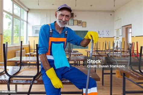 A Portrait Of A School Janitor Stock Photo Download Image Now Cap