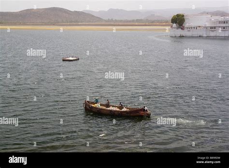 India Rajasthan Udaipur A boat ride in lake Pichola the Taj Lake palace ...