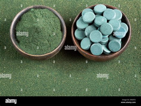 Spirulina Algae Powder And Tablets Arthrospira Platensis Stock Photo