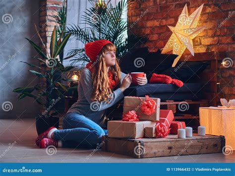 Redhead Female Drinks A Hot Coffee In A Living Room Stock Photo Image Of Merry Fashion