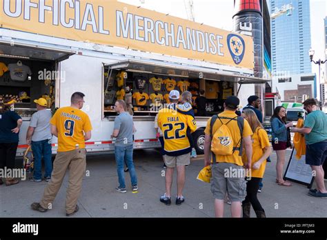 Nashville Predators fans outside arena in Nashville buying fan stuff ...