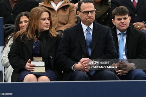 Josh Shapiro holds hands with his wife, Lori Shapiro, at his swearing ...