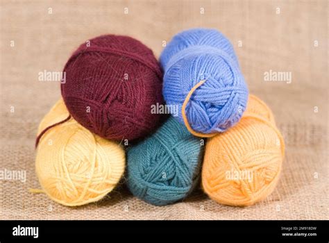 Different colors hanks of yarn threads Stock Photo - Alamy