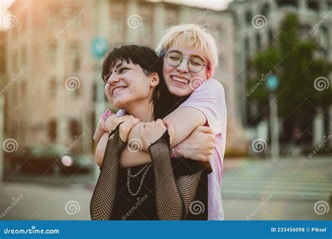 Young Gender Fluid Couple Hugging Stock Photo Image Of Fluid Couple