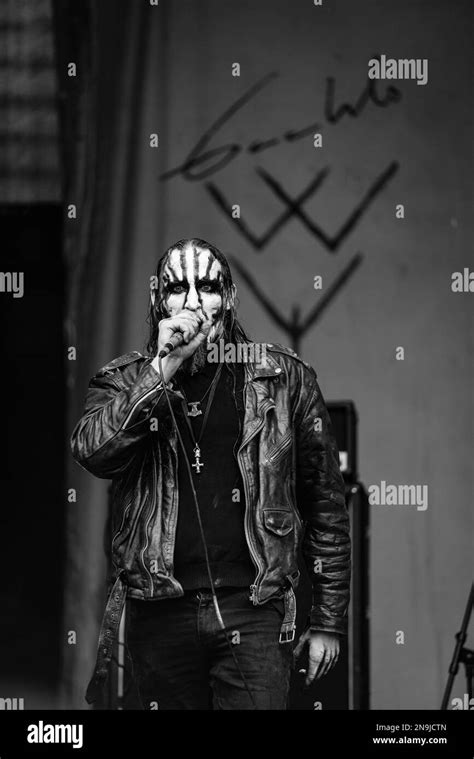 A Vertical Grayscale Shot Of Gaahl S Wyrd Performing At The Brutal