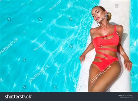 Elegant Sexy Woman Orange Bikini On Stock Photo 1410549083 Shutterstock
