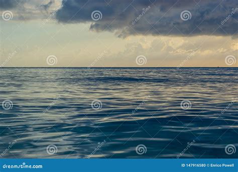 Twilight Skies After Sunset On The Beach Calm Low Tide Silky Ocean