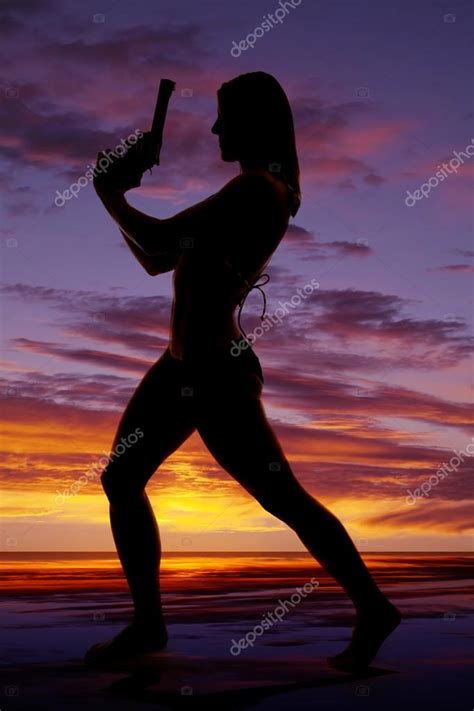 Silhouette Of Woman In Bikini Stock Photo Alanpoulson 60157767