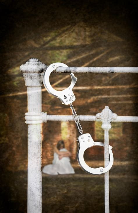 Handcuffs On Bed Photograph By Amanda Elwell