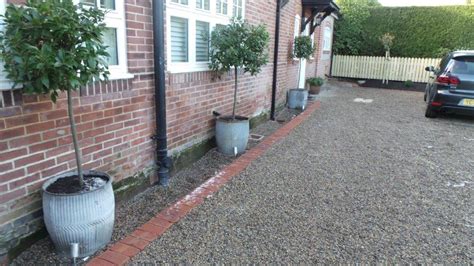 Gravel Driveway Edged with Red Brick - Olive Garden Design and Landscaping