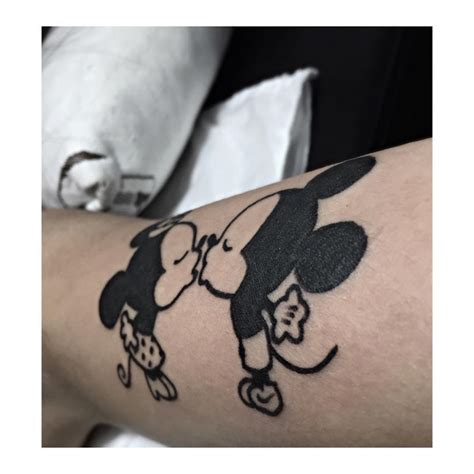 Mickey And Minnie Mouse Tattoos Kissing