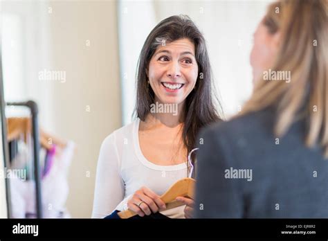 Small Business Owner Talking To Customer In Store Stock Photo Alamy