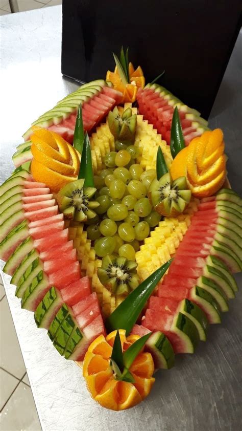 Pin By Tahmid Ahmad On Fastfood Fruit And Vegetable Carving Fruit Platter Designs Fruit Platter