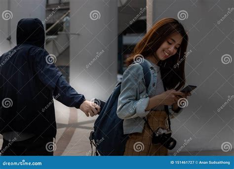 Selective Focus On Hands Of Pickpocket Thief Stealing Wallet From