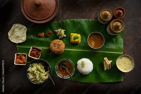 South Indian thali on a banana leaf Stock Photo | Adobe Stock