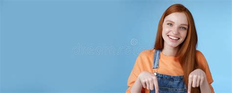 Friendly Happy Redhead Girl Smiling Lively Pretty Grin Pointing Down