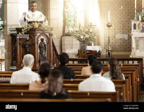 People Praying In Catholic Church