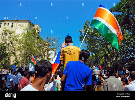 Man celebrating election victory waving MNS flag , Maharashtra Navnirman Sena supporters ...