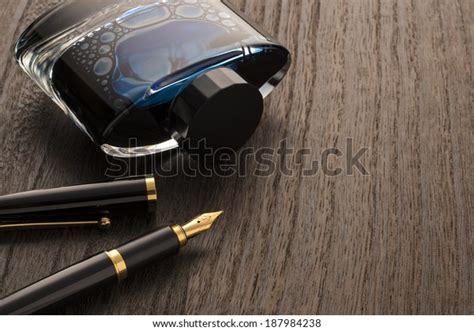 Fountain Pen Ink Bottle On Table Stock Photo Edit Now