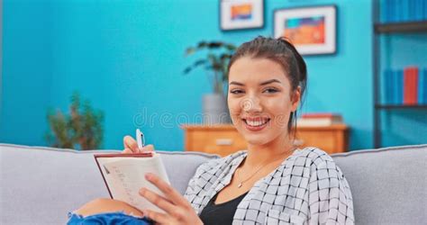 Shot Of Woman S Smiling Face Looking Into Camera Brown Eyes Dark Hair Girl Sits On Stock