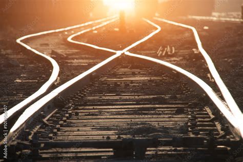 Railroad tracks at sunset Stock Photo | Adobe Stock