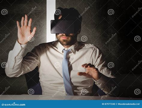 Man Pretending To Touch While Wearing Virtual Reality Headset Stock