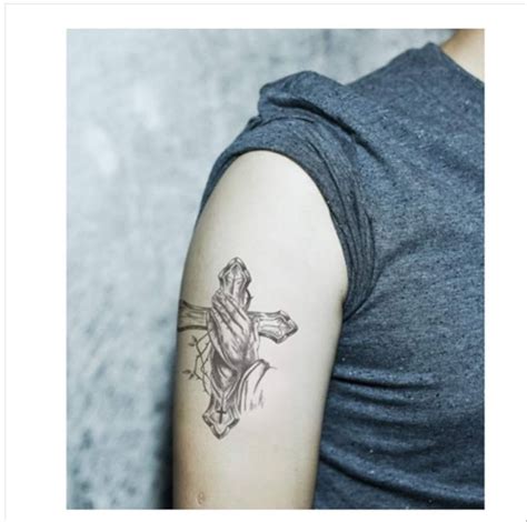 Praying Hands Tattoo On Back