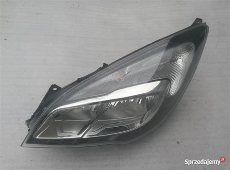 Opel Meriva B reflektor lampa lewy przód Przeźmierowo Sprzedajemy pl