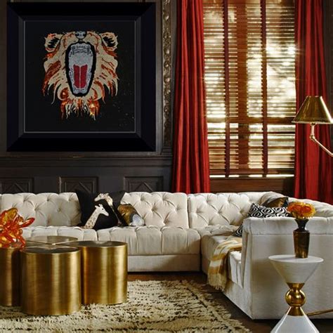 A Living Room Filled With White Furniture And Red Curtains