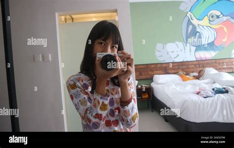 Manado Indonesia October 8 2022 A Beautiful Girl Takes A Picture Of Herself In The Mirror